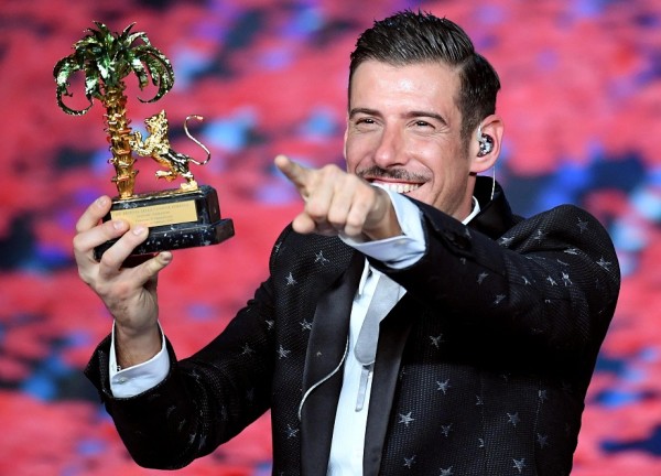 Italian singer Francesco Gabbani poses with the award on stage after winning the 67th Festival of the Italian Song of Sanremo, during the closing ceremony in Sanremo, Italy, 12 February 2017. ANSA/CLAUDIO ONORATI 